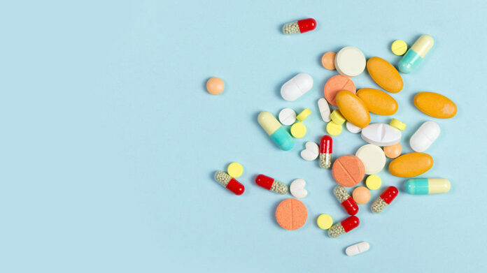 A selection of different pills with many shapes and colours.