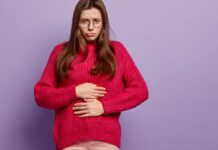 Can GLP-1 weight loss drugs lead to nutritional deficiencies? Woman having pain